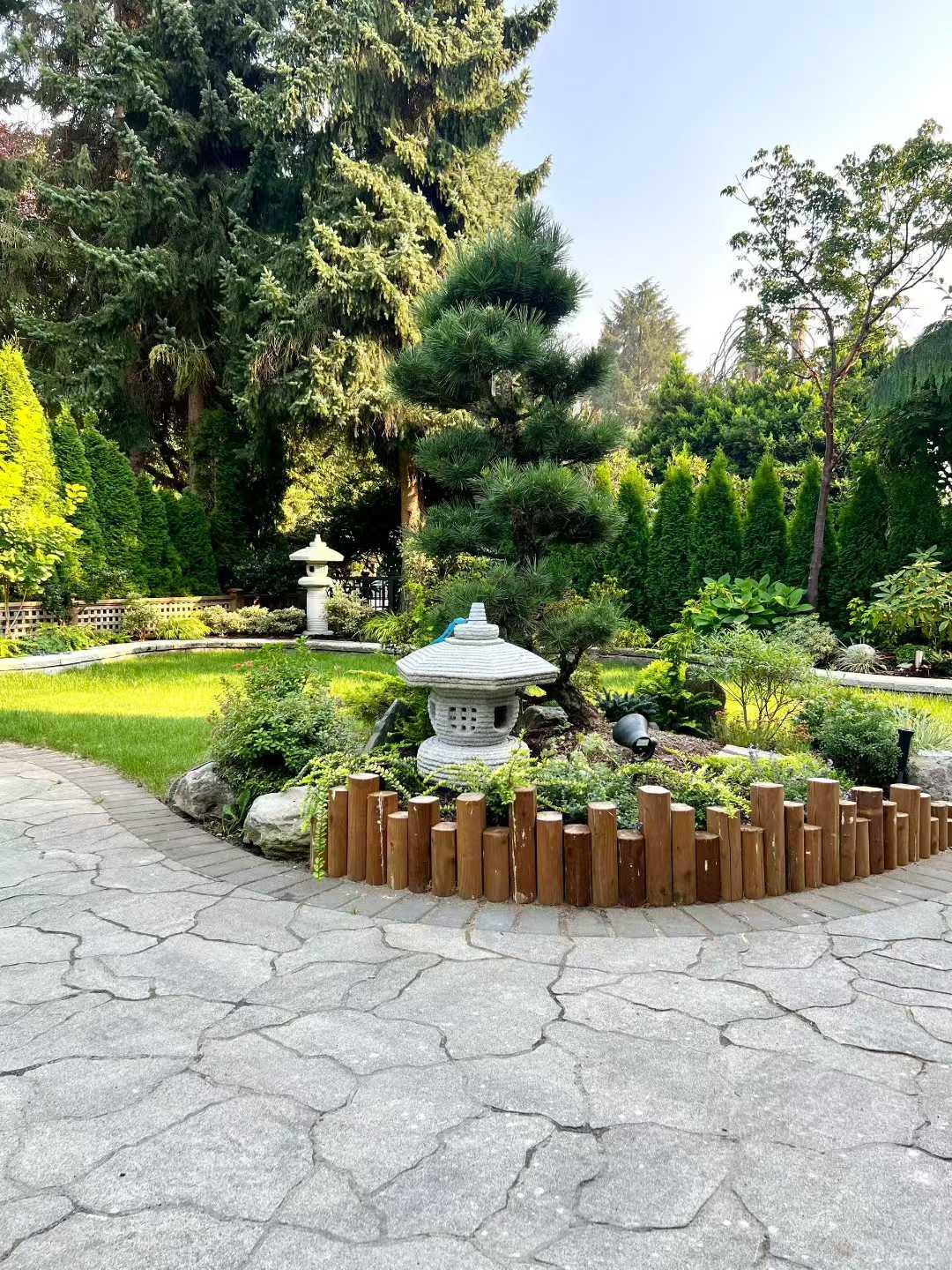 Planting and softscape integrated with hardscape at a Beechwood residence project.